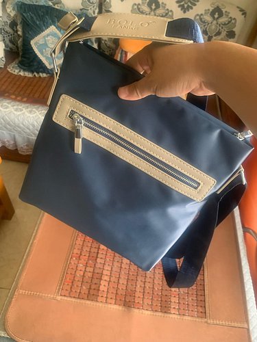My mother bought me a new bag 💼 it’s very cool very swag I like it