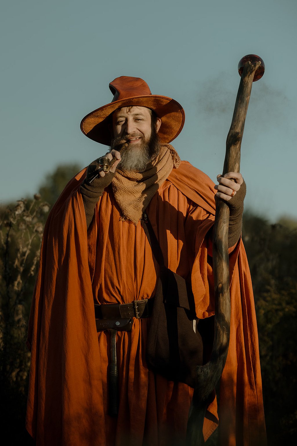 Ted from Nerd Immersion, dressed as Theodore the Orange, with a pipe in an autumn photoshoot