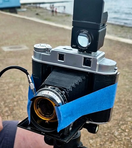 One way to keep a filter in place on a classic folder when you've none that fit. Franka Solida II with CHI Viewfinder on top ...