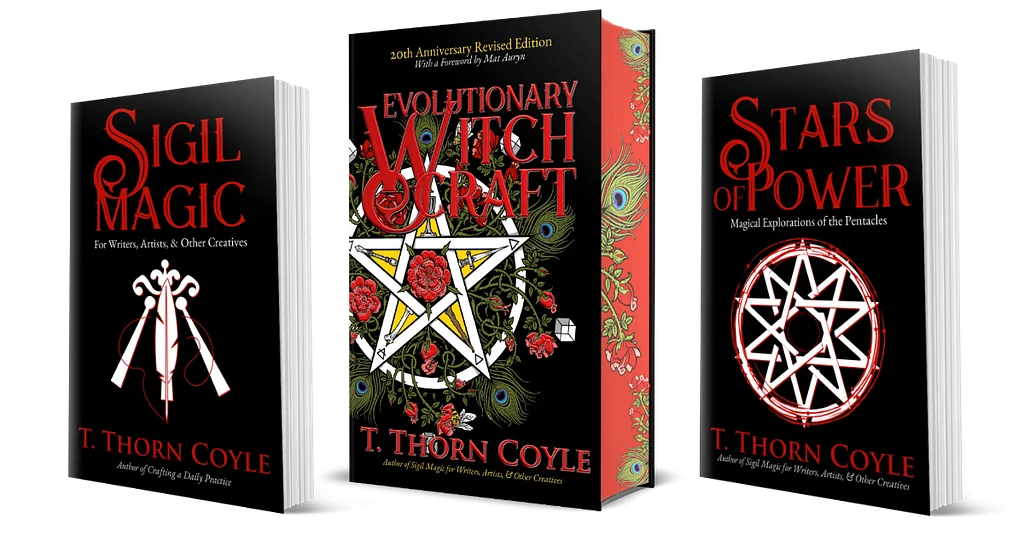 three books by T. Thorn Coyle: Sigil Magic, stars of power, and the deluxe edition of Evolutionary Witchcraft with sprayed edges.