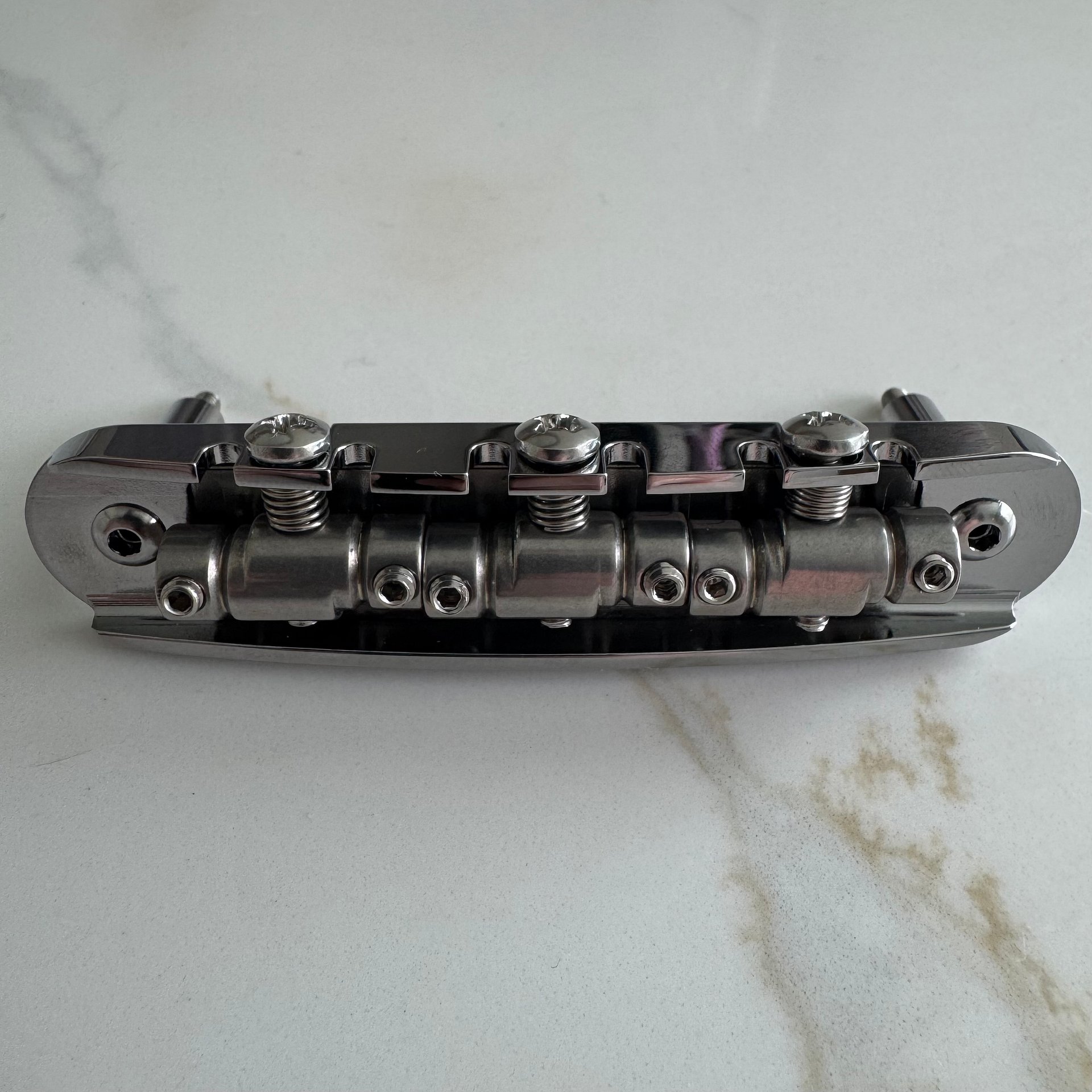“The Goliath” Chrome-Plated Brass Jazzmaster / Jaguar / Mustang Bridge with USA Made Compensated Stainless Steel Saddles product image (4)