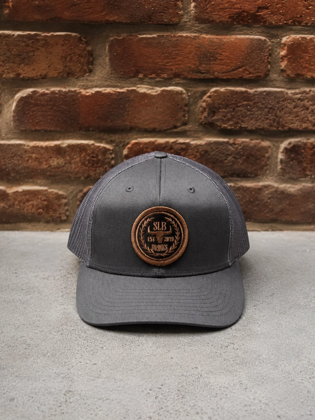 Grey SLB Drinks Embroidered patch Trucker Hat product image (1)