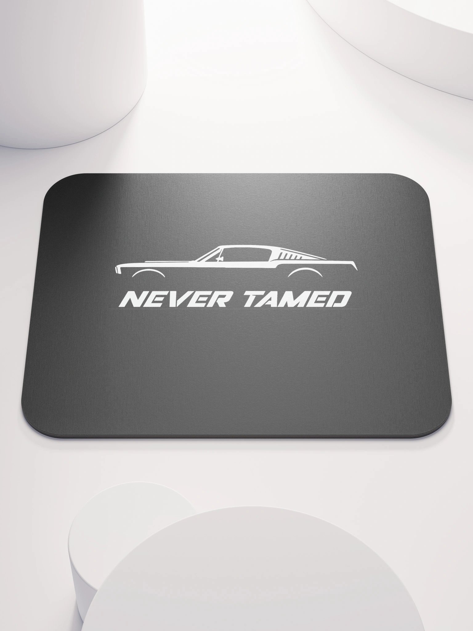 NEVER TAMED – Premium Mouse Pad product image (1)