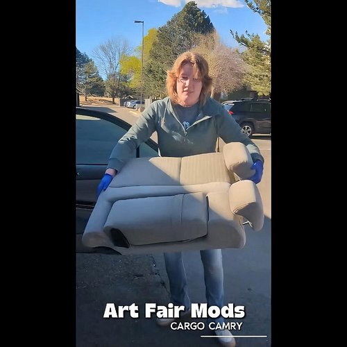 Car mods to fit all my art fair supplies: Am I cool yet?

Some of us gotta make do with what we've got (,: No room for extra ...