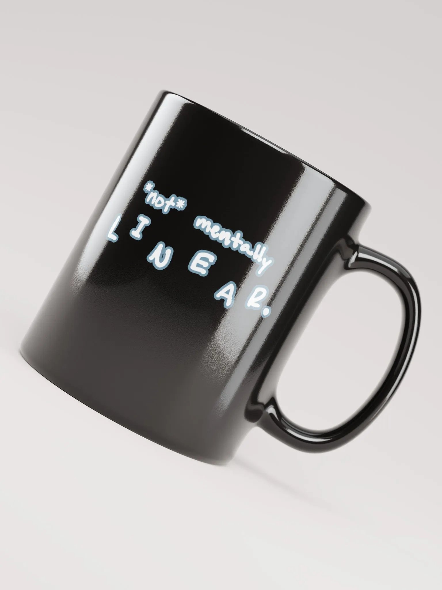 *not* mentally linear (lined design, #709AAF) glossy black mug product image (5)