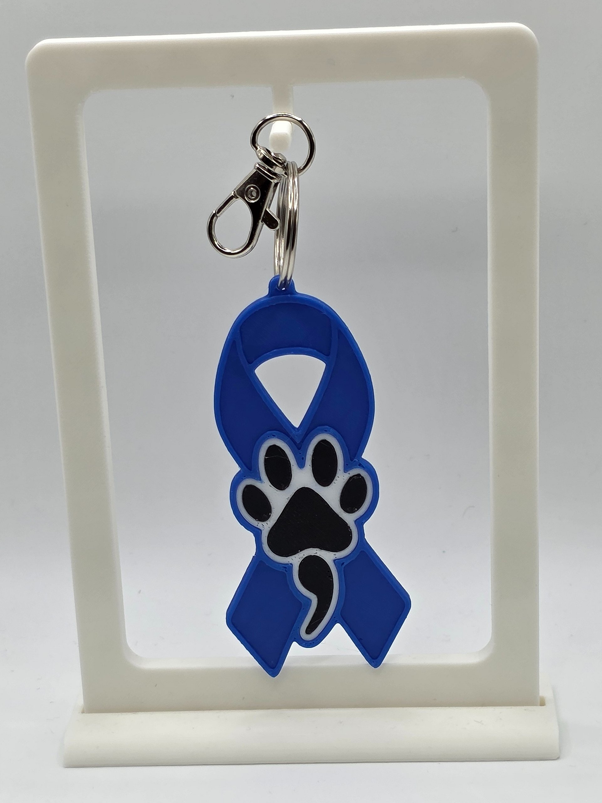 💙 Blue Awareness Ribbon Keychain | Dog Paw Semicolon product image (1)