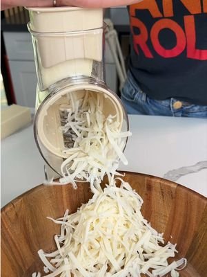 Rotary cheese grater and vegetable slicer! I love this thing! #tiktokshop #fyp #cheese #chef 
