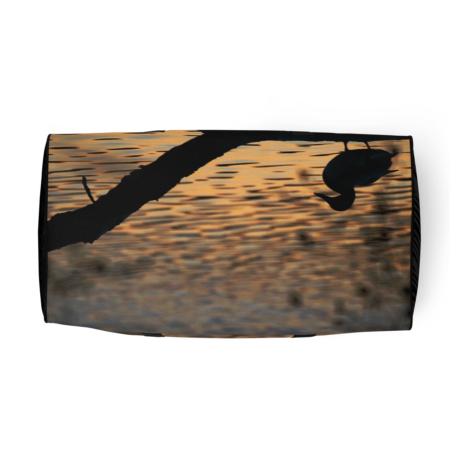 Travel bag - Silhouette of a duck on a branch in the water product image (6)