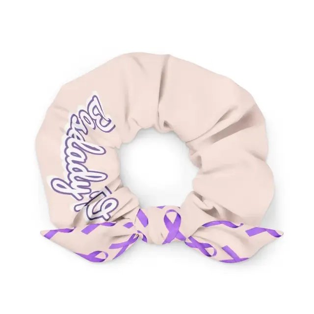 A soft accessory with a strong message. Wear it for awareness, for solidarity, or for someone you love. 💜 #GynecologicCancerAwareness #PurpleRibbon https://bosseladytv-shop.fourthwall.com