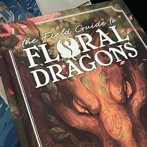 Reading my new Floral Dragons book after I met the creators today at #gamesconcanada2026 Eeeee!!!! Beaded Dragon Inspo for Da...