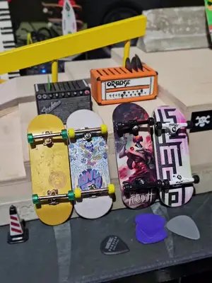 Fallujah selling PRO Fingerboards at their merch table. Only 50 made! These aren't your average tech decks. Trucks have decent bushings and the wheels have bearings for a smooth roll. Pretty cool snag. #fingerboard #fingerboarding #blackriver  #fallujahband #bandmerch 