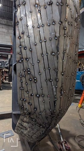 The skinning process has begun for Bimmer Torres' cactus sculpture.  We entertained various ways to wrap the contoured sectio...