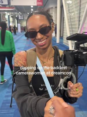 Word on the block is she’s taken though 🫣 #dreamcon #camerawoman #camsosham #fyp  