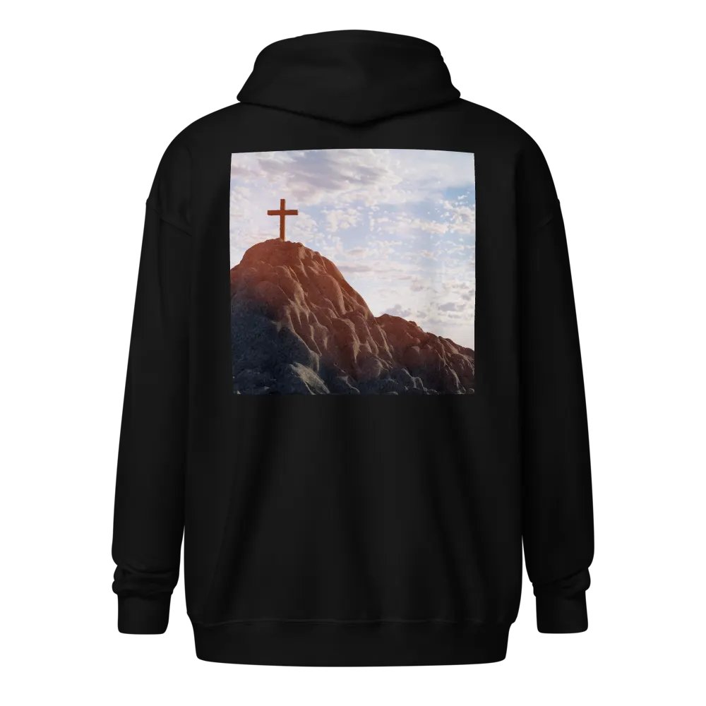 Wooden cross standing atop a rocky hill or mountain, under a sky filled with soft clouds and warm sunlight Hoodie product image (1)