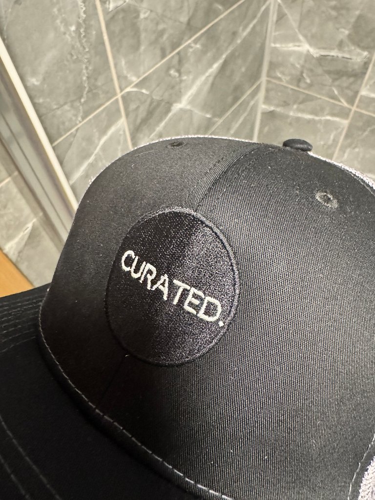 CURATED.