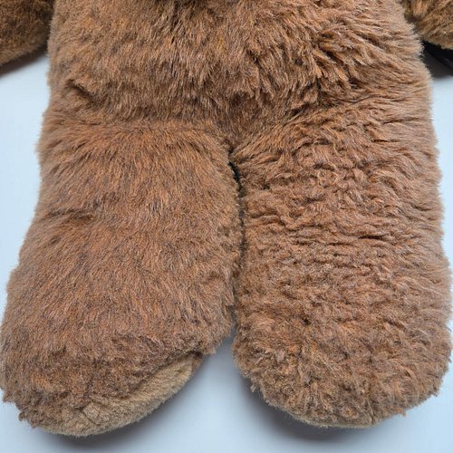 Finishing up a teddy bear spa treatment - he was already looking nicer after his bath, but this photo really shows the differ...