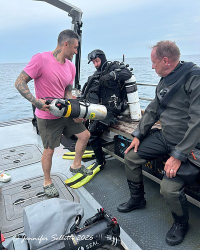 Pat getting suited up for his first dive on USS Murphy.