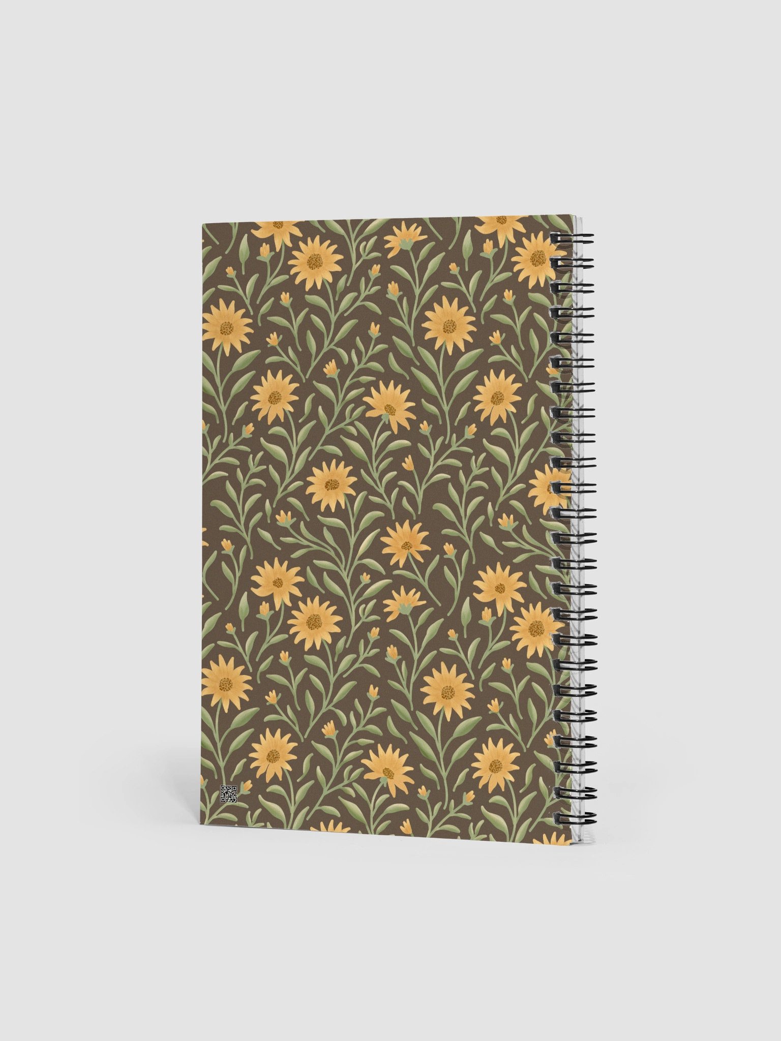 Golden field spiral notebook with floral design on dark background. Elegant botanical journal product image (3)