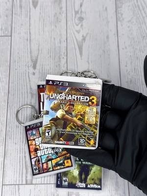 Bringing some PS3 nostalgia to your keychain collection. 🎮🖤 These miniature PS3 game cases are 62 × 48.6 mm, 3D printed in clear PETG for added durability and finished with stainless steel hardware. Each case uses neodymium magnets for that satisfying magnetic snap closure. 🧲✨ Featured in this video: 🎮 Uncharted 3 🎮 Call of Duty 4: Modern Warfare 🎮 The Last of Us 🎮 Gran Turismo 5 🎮 Grand Theft Auto V Tiny cases. Real game nostalgia. 😈 Made by gamers, for gamers. 🖤 Studio Nightshade TikTok hashtags #StudioNightshade #3DPrinting #PS3 #GamingNostalgia #Gamer