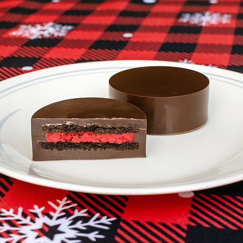 Bought a new mold to make my chocolate-covered Oreos more professional looking. First tests here are dark chocolate-covered h...