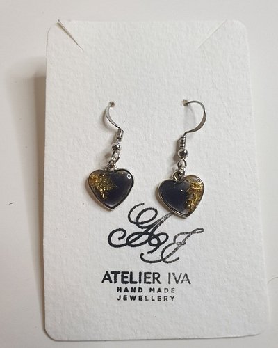 Check this out!!!!

 Black & Gold Glitter Heart Resin Earrings – Stainless Steel Hooks https://www.jandivision.co.uk/products...