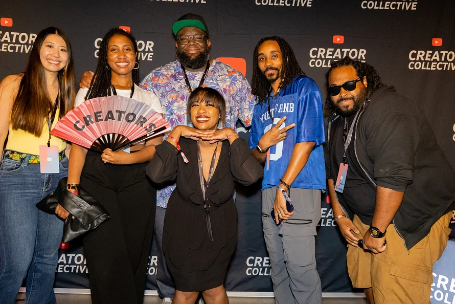 DDS618 (center back) with various creators at the YouTube Creator Collective in Dallas, Tex. in April 2025. Pictured from left to right are Rebecca Emcee, Kali Rhe, Angelic Lela, Rena Marq, and Sainted Whisper.