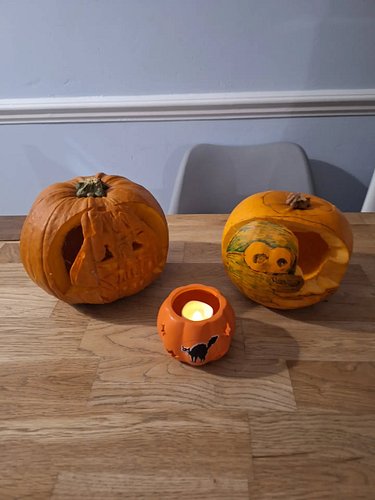 Our 2025 Halloween Carved Pumkins (aka Jack-O-Lanterns) Mine is Vader, my partners is a Spongebob reference (The Hash Singing...