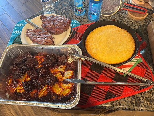 Burnt ends, rib eye steak for wife, ny strip for me, corn bread, mushrooms and onions, grilled pineapple, baked potatoes, red...