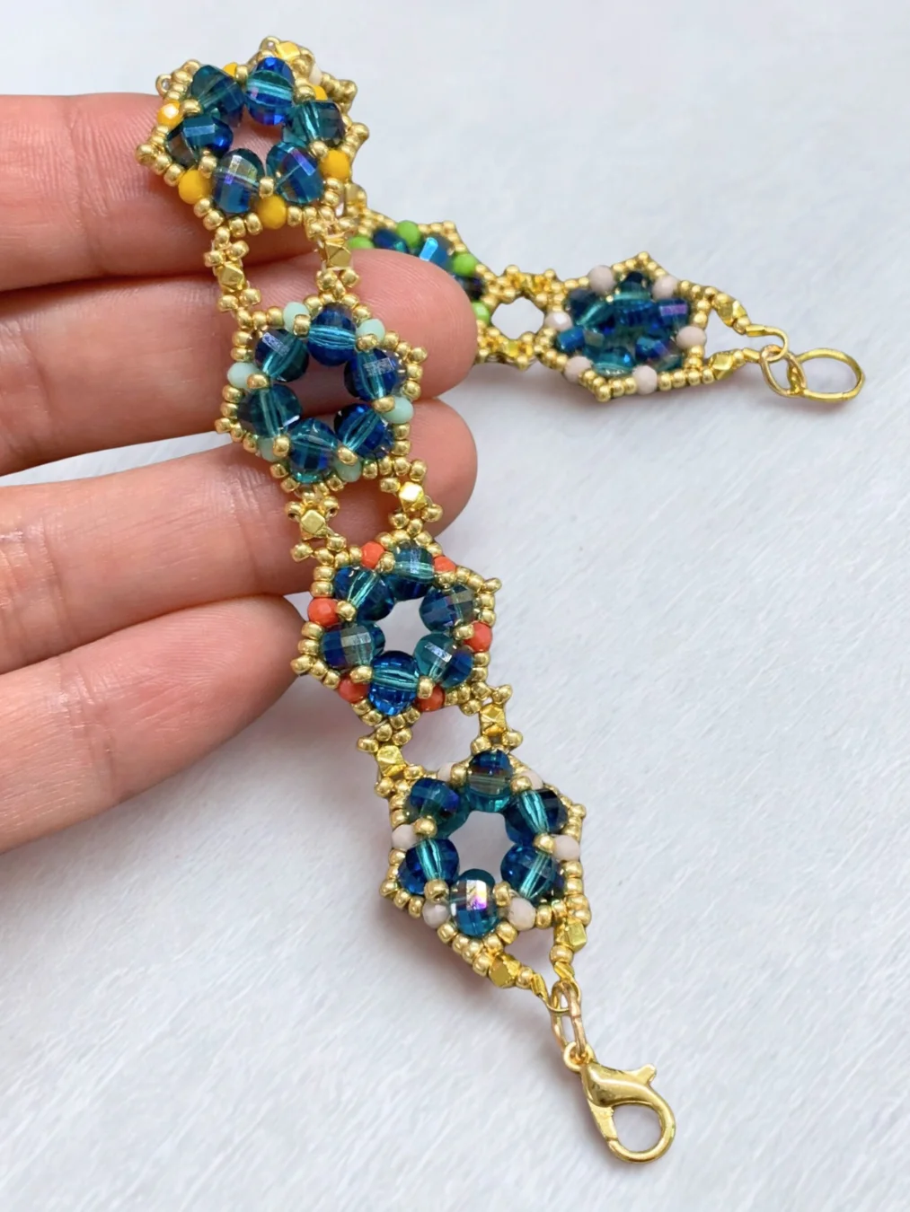 Hand-woven Teal, Gold, Multicolored Crystal Rondelle and Seed Bead Bracelet product image (1)