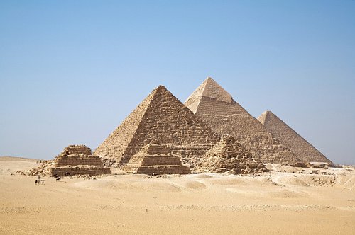 Quiz time! The Great Pyramid of Giza held the record for the world's tallest structure for millenia, but which of these event...