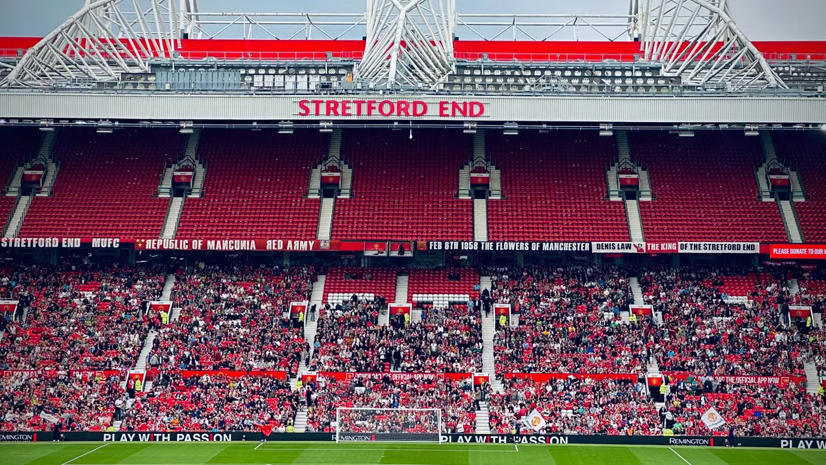 A packed stadium crowd of 100,000 people, representing 100,000 YouTube subscribers and the Silver Play Button