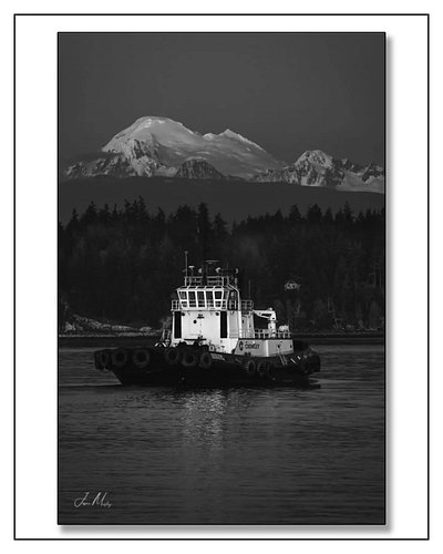 Crowley's Tug Protector in Guemes Channel with Mt. Baker looming large overhead. 
Www.jasonmosleyphotography.com 

mtbaker · ...
