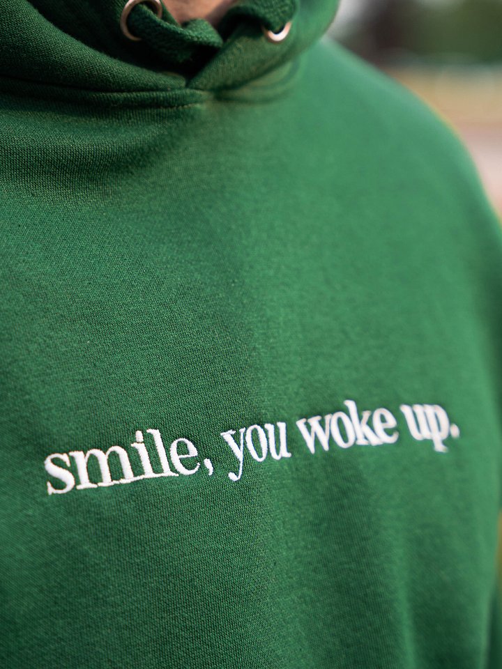 "Smile, you woke up." - Happy Hoodie (Embroidered) product image (1)