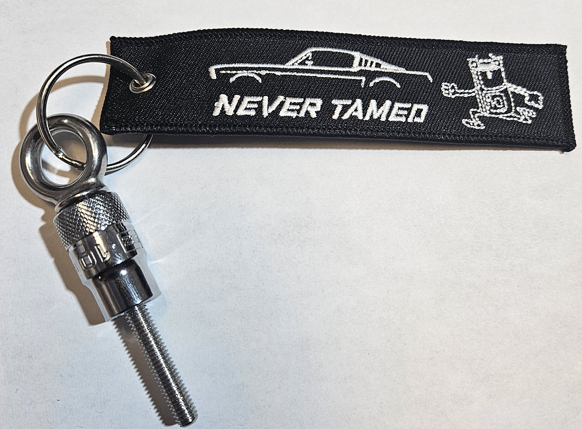 "Never Tamed" Flight Tag + 10mm Socket Keychain product image (1)