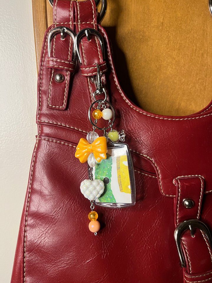The Caterpillar’s Peaches & Pickles Deluxe Bag Charm product image (1)