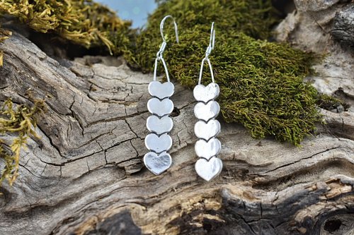 A quiet cascade of silver hearts — simple, balanced, and made for everyday wear.

Because softness doesn’t cancel out strengt...