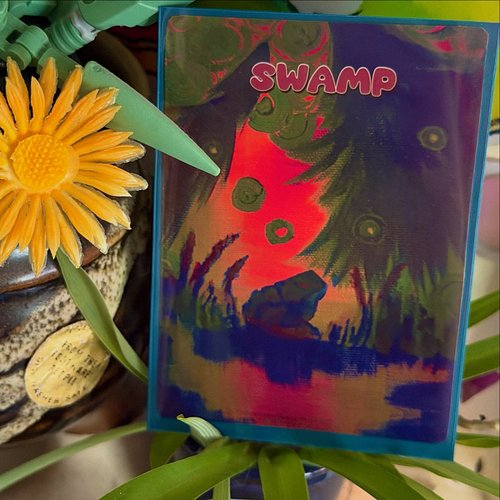 I made a tcg card! Issa frog in a swamp :3 inspired by having built my own frog deck, I wanted to make some cool lands for it...