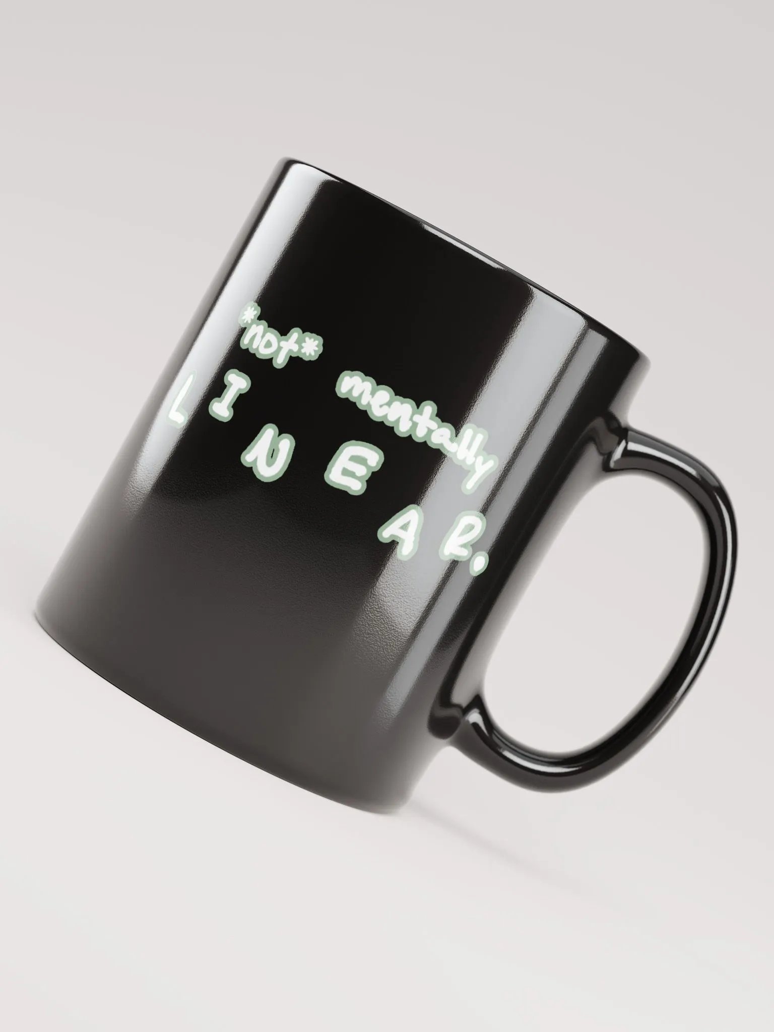*not* mentally linear (lined design, #96B697) glossy black mug product image (5)