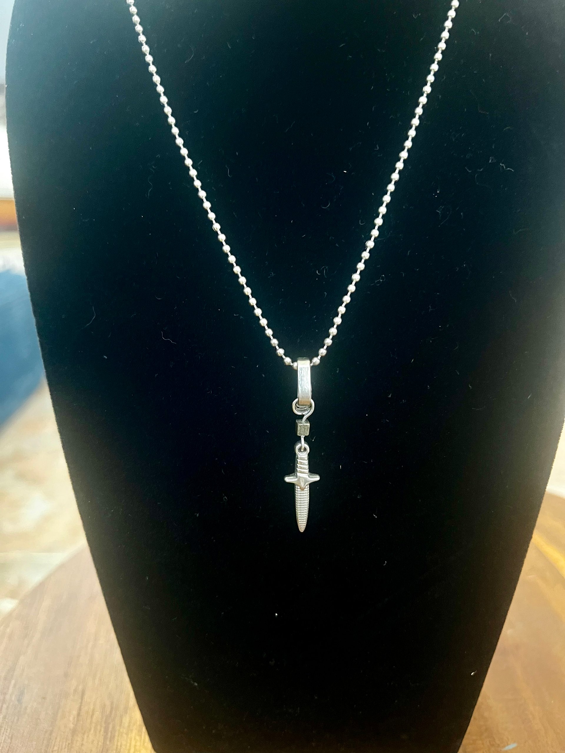 Pyrite and stainless steel dagger necklace product image (1)
