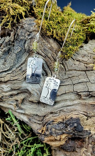 These tiny trees started as sketches and sheet silver — now they’re a pair of earrings that feel like a pocket-sized forest.
...