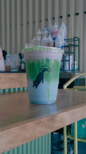 I’m back with another @cltpride drink that you don’t want to miss. 

@blackcatcoffeeclt has a tie-dye matcha made with orange...