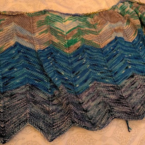 Recently I've been working a bunch on my Ocean Waves blanket now that it has started to cool off a bit. I have am now 3/12 co...