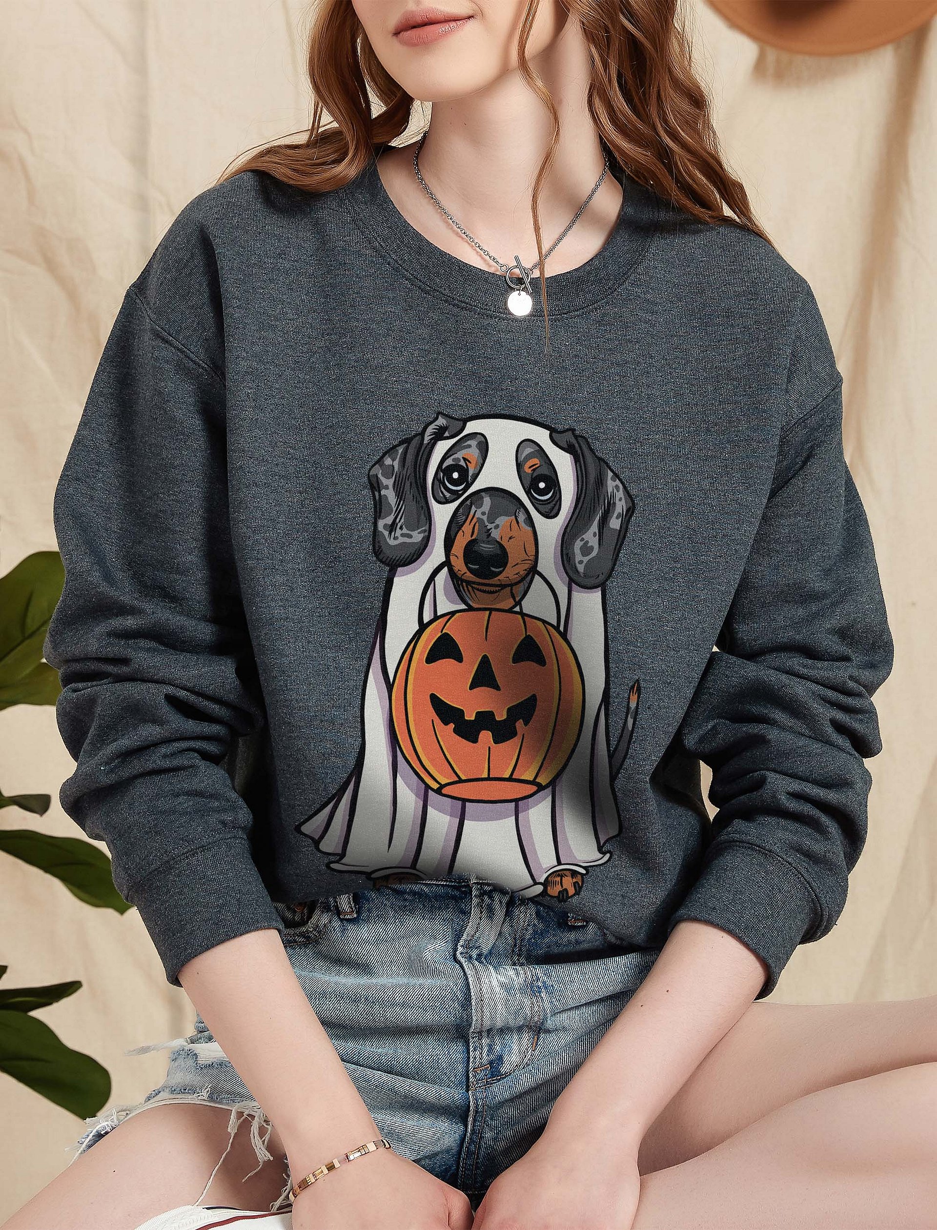 Funny Halloween Dachshund(Dapple) Sweatshirt | Funny Doxie/Wiener Wearing a Ghost Costume and Holding a Pumpkin Basket product image (2)