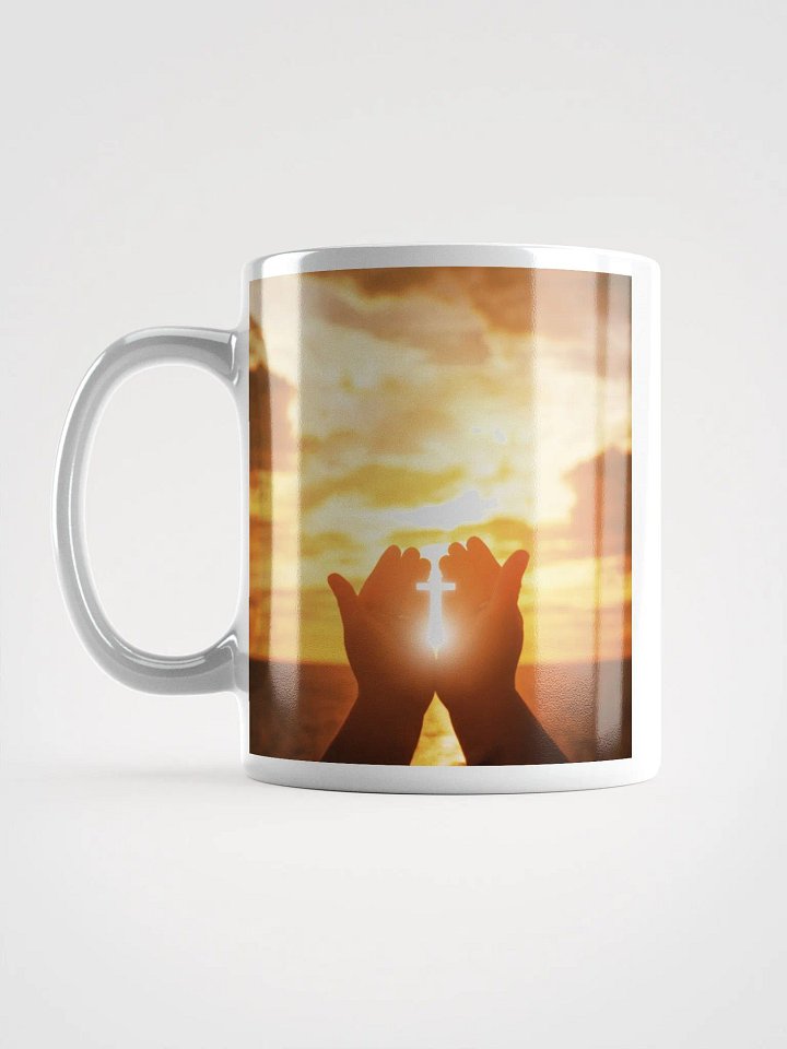 Cupped hands holding a glowing cross silhouette & Wooden cross being held up against the backdrop of a sunrise Mug product image (2)