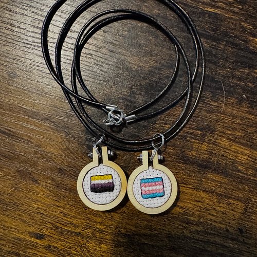 Two more custom double layer necklaces finished today!
The first one is the trans 🩷🤍🩵 + nonbinary 💛🤍💜🖤 pride flags for @kris....