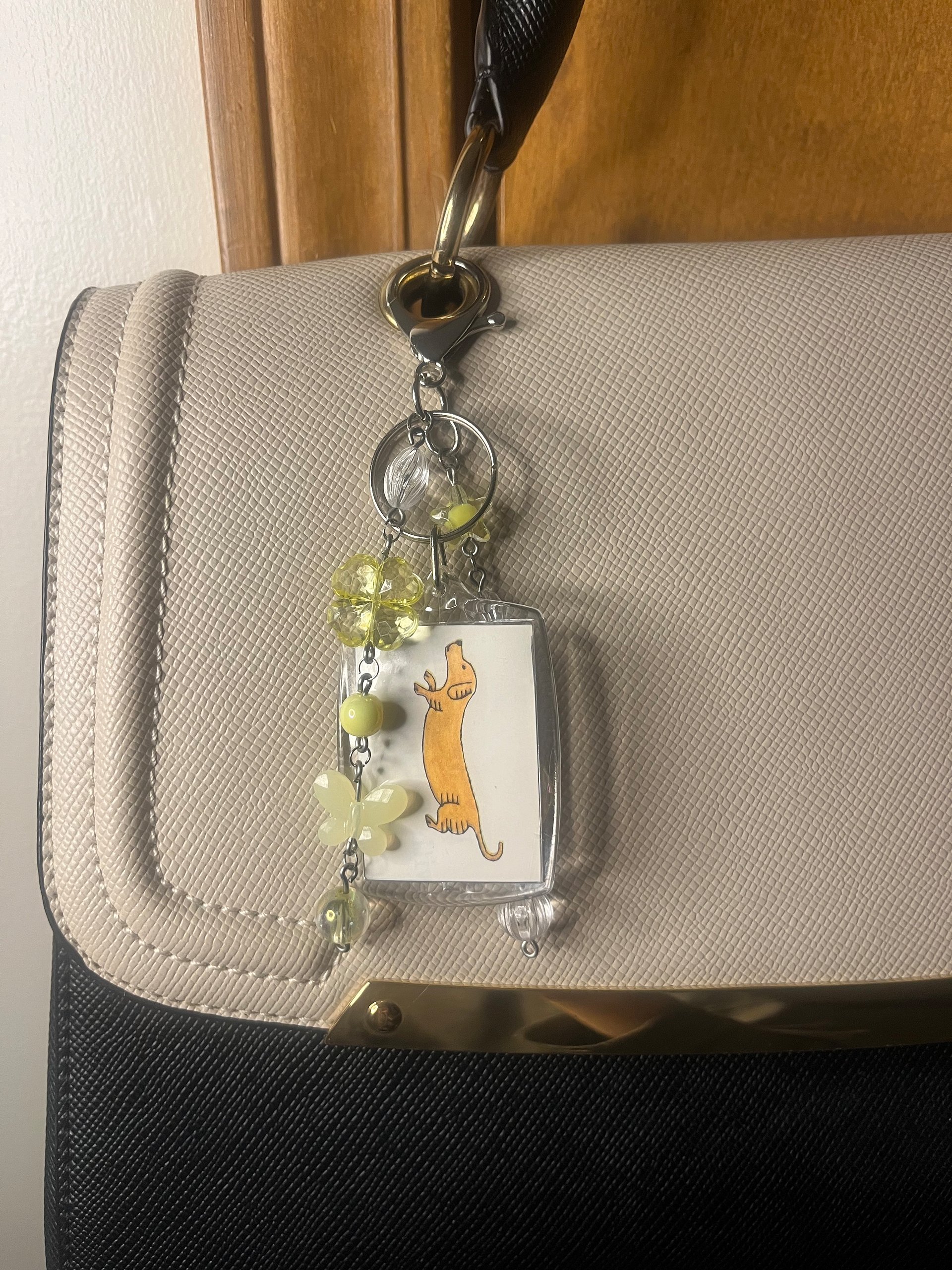 Two Yellow Dogs Deluxe Bag Charm product image (1)
