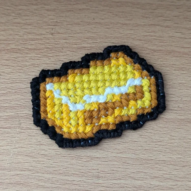 Gold "Butter" Cross Stitch Patch product image (1)