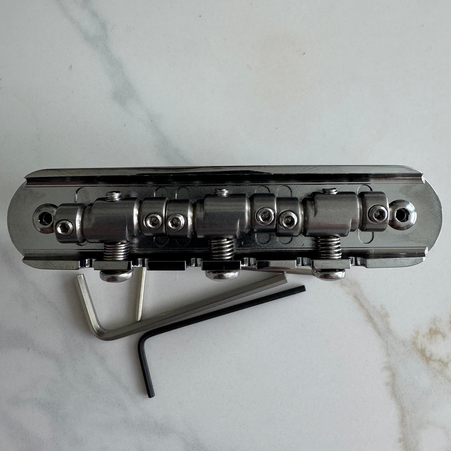 “The Goliath” Chrome-Plated Brass Jazzmaster / Jaguar / Mustang Bridge with USA Made Compensated Stainless Steel Saddles product image (8)