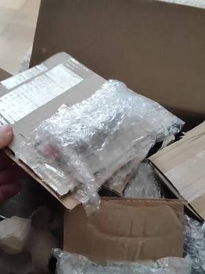 I have never seen this way of packaging in my life and I ordered several hundred of packages in my 10 years of collecting. I have to say this is inovative, very good protection that the plastic doesnt brake or the card doesnt get damaged or bent. Also in the box was egg carts shreded. It takes a lot of time to do such protection. A+ for this and I have had to show you this because it is unique.