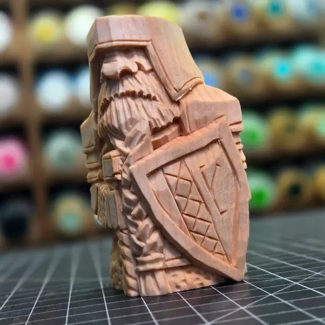 Another Dwarven Shield Warrior.  Experimenting with different ideas for the shield.  Looked up some legitimate Tolkien Dwarven Runes, because of course he has a whole alphabet for them.. 😆 🤣  As one does. 4 inches tall, 2inch by 2 inch, carved from Basswood by hand, with knife/gouge. #woodcarving #whittling #fantasyartist #lotr #lotrart 